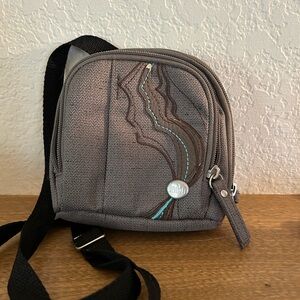 Haiku  Pouch Crossbody Bag with Turquoise Accent. Brown/gray tone